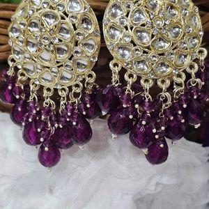 Golden Kundan With Purple Beads Earrings .