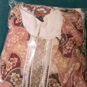 cream colour gharara and top with dupatta