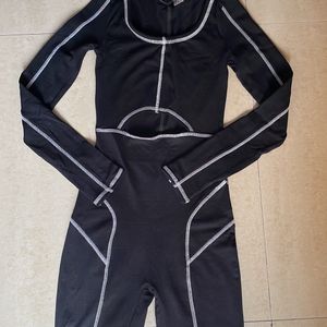 Off duty Model Knee length Jumpsuit