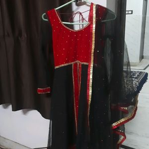 Red & Black Net And Shehneel Frock Suit