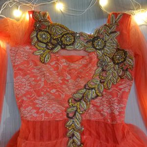 Orange color embroider gown for Women