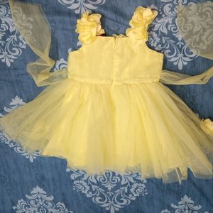 Yellow Flared Party Wear Frock For Baby Girls