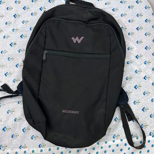 Black Wildcraft bag (backpack)