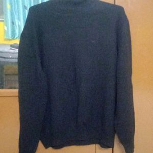 This Is A Turtle Neck Sweater In Good Condition