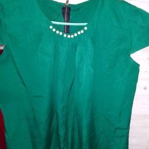 Green Colour Top With Pearl On The Neck