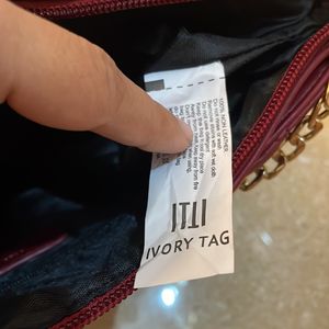 Ivory Tag Maroon Handbag