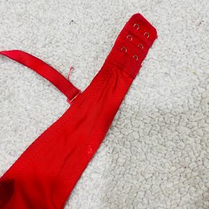 Red Color Puffe Bra Under Plastic Frem