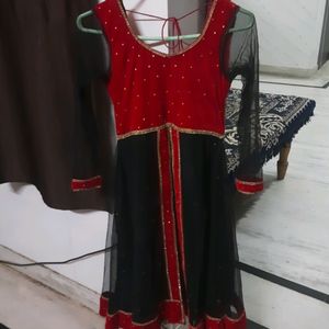 Red & Black Net And Shehneel Frock Suit