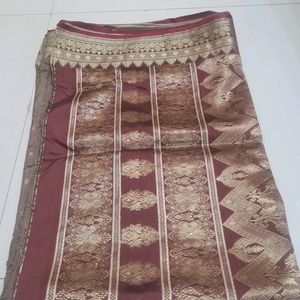 Mauve Color Saree With Golden Print Border