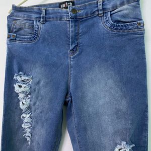 LIGHT BLUE RIPPED JEANS FOR WOMEN