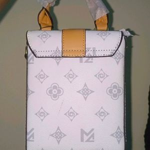 White Sling Bag With Tag Attached