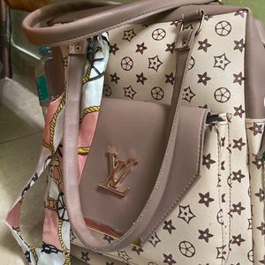 Loius Vuitton Backpack/ Handbag