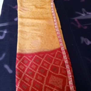 Mustard and red Colour Light work Saree