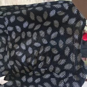 black shrug with leaf print