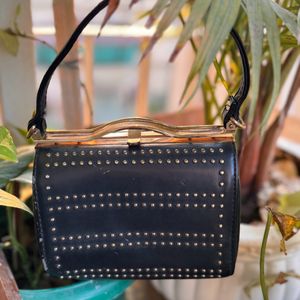 Black embellished sling bag