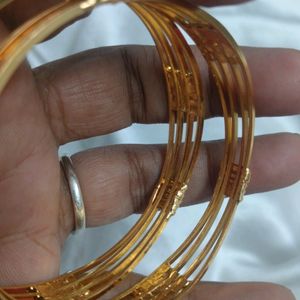 Gold Ad Bangles