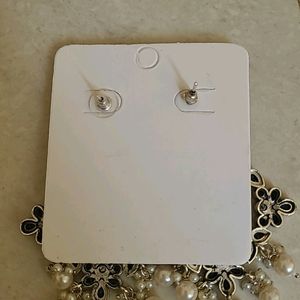 Black Earrings With White Pearls