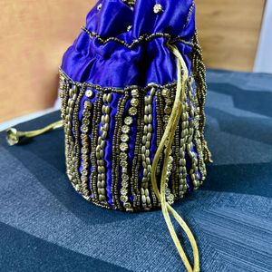 Purple Gold Potli Bag Hand Worked Desion