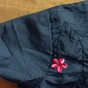 It's Black Kurti With Red Thread Worked Flowers 🌺