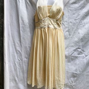 25W. CUTE CREME FROCK