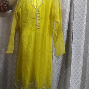 A Very New Yellow Coloured Net Suit With Pajami