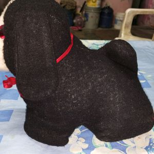 A Qute Black Dog Soft Toy