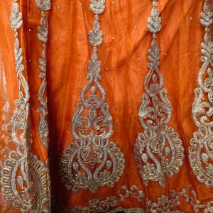 Orange And Golden Embroidered Lehenga