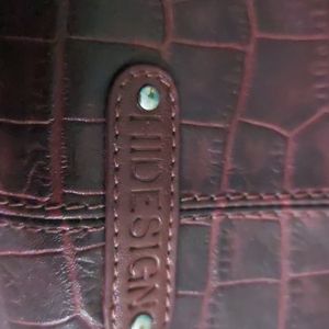 Hi-design embossed leather handbag