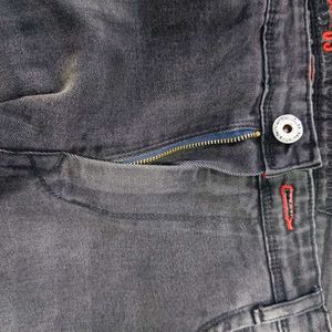 Men Tapered Fit Mid-Rise Jeans