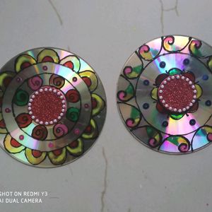 A pair of diya holders