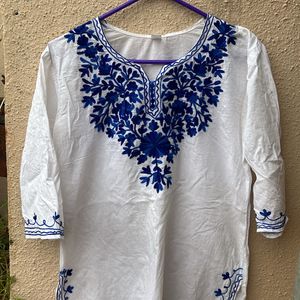 Short Kurti With Blue Work On It