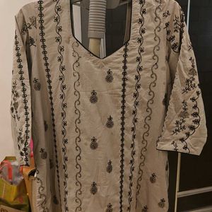 Mauve Kurti With Sippi Work