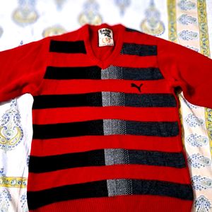 Branded red color sweater for men.