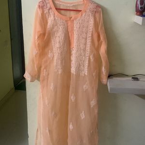 Peachy Orange Transparent Chikankari Kurti With inner