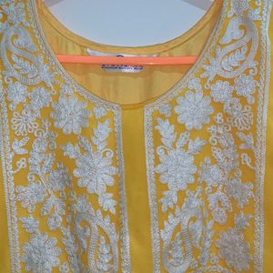 Yellow Kurti with half net and chikankari work