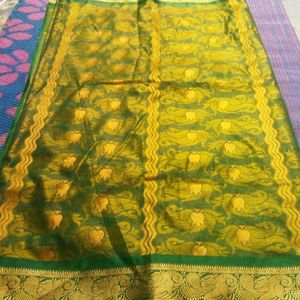 Green Saree With Golden Flowers Design