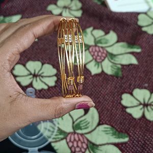 Real gold look bangles with stone work