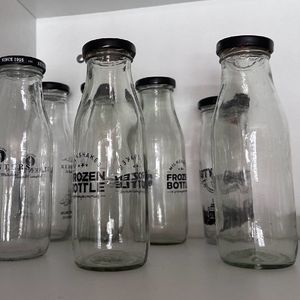 4 Juice Bottles In New condition