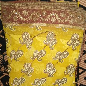 Tissue Yellow And Brown Gold Saree