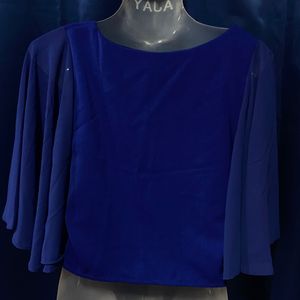 Blue Crop Top With Pretty Butterfly Sleeves.