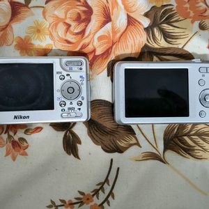 Nikon S1 And Panasonic Lumix Camera