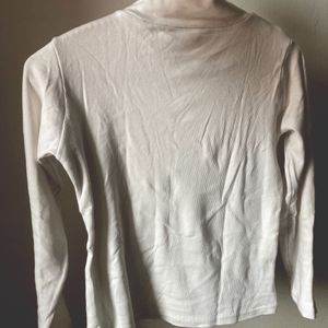 White women's turtleneck.