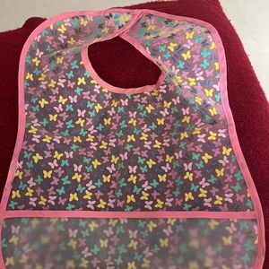 Preloved Mothercare Waterproof bib -flowers