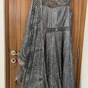 Grey Glitter Ethnic Gown With Transparent Neck