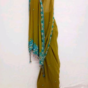 Olive Green Saree With Blue Zari Work On