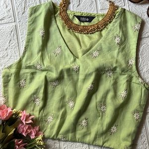 Cute pastel green v neck blouse