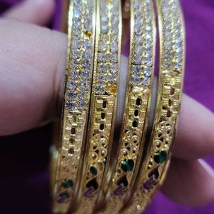 4 Bangles 1 Bracelet Never Used Before