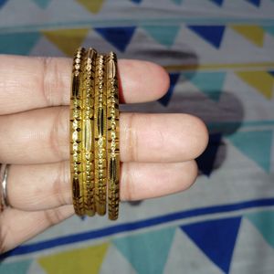 4 golden Bangles