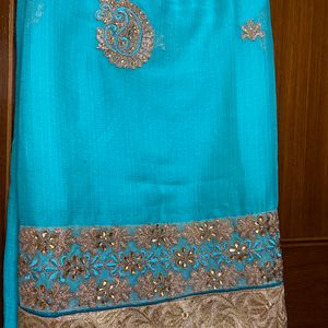 cyan saree with stitched blouse