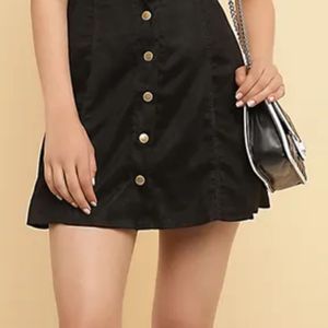 A line buttoned black skirt